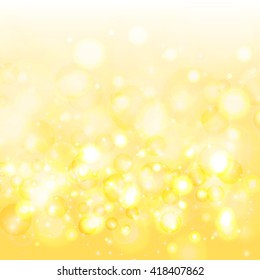 Romantic gold bokeh with shining circles . Defocused background. Vector.