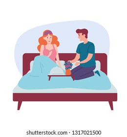 Romantic happy couple having breakfast in bed
