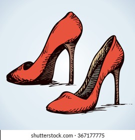 Romantic icon of two classic scarlet women's footgear item isolated on white background. Freehand ink hand drawn picture sign sketchy in art color doodle style. Closeup side view with space for text