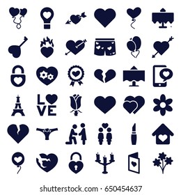 Romantic icons set. set of 36 romantic filled icons such as restaurant table, eiffel tower, flower, lipstick, heart with arrow, broken heart, rose, women couple, heart ribbon