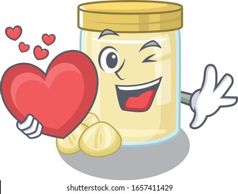 Romantic macadamia nut butter cartoon picture holding a heart