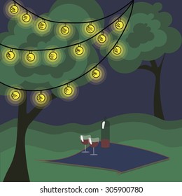 Romantic picnic at night with flashlights