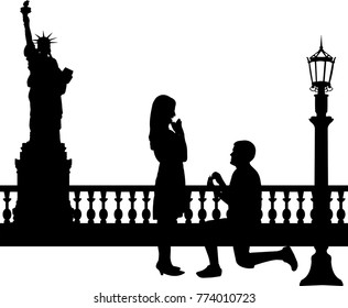 Romantic proposal in New York of a man proposing to a woman while standing on one knee silhouettes, one in the series of similar images