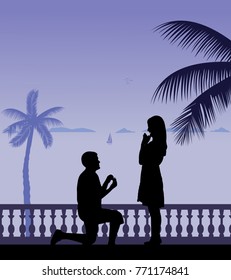 Romantic proposal on seacoast between the palms on the beach of a man proposing to a woman while standing on one knee silhouettes layered