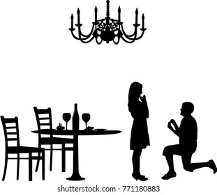 Romantic proposal in a restaurant of a man proposing to a woman while standing on one knee silhouettes, one in the series of similar images