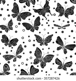Romantic seamless pattern with butterflies and flowers in black and white