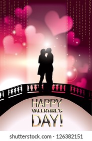 Romantic Valentine couple kissing on a bridge