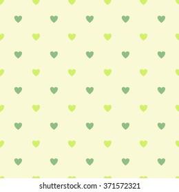 Romantic vector illustration seamless pattern of green hearts on light background.Endless texture can be used for printing onto fabric and paper.Heart shapes wallpaper.Polka dots.cute love pattern