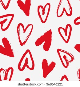 Romantic vector texture with hand drawn hearts. Classic valentines pattern with brushed hearts in red and white colors.