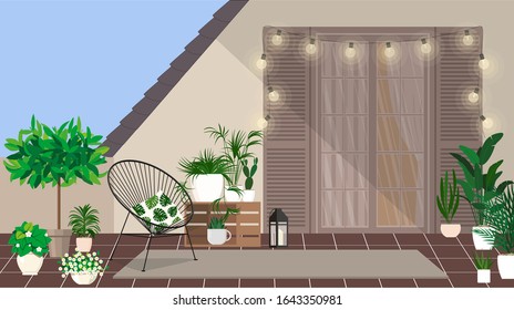 A rooftop balcony with an armchair and a small mini garden.