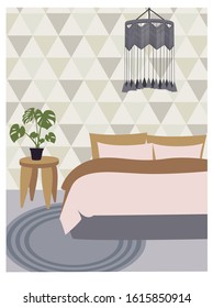 Room with plant and triangle wallpaper