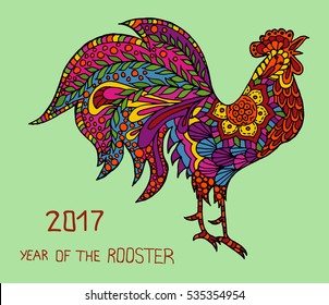 Rooster, symbol of 2017 on the Chinese calendar. Silhouette of cock, decorated with floral patterns. Image of 2017 year of Rooster. Bright Cockerel