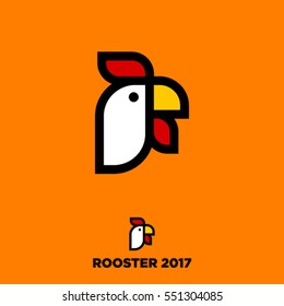 Rooster year. 2017 logo. Rooster emblem. Linear logo on an orange background. The symbol of the new year.