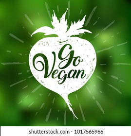 Root vegetable and lettering Go vegan on a green blurred background. Vegetarian lifestyle concept. Hand drawn vector illustration
