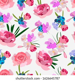 Rose flowers on a white background with blueberries