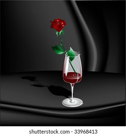 rose in goblet with wine