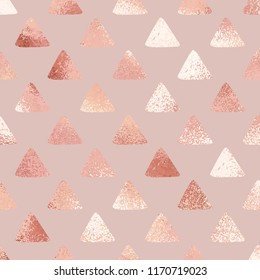 Rose gold. Abstract background with triangles. Vector texture for design