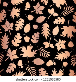 Rose Gold foil autumn leaf silhouettes seamless vector background. Copper shiny abstract fall leaves shapes on black background. Elegant pattern for digital paper, Thanksgiving card, party invitations