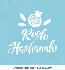 Rosh Hashanah - handwritten modern lettering. Happy new year in Hebrew. Template for postcard or invitation card, poster, banner with pomegranate on blue background. Vector illustration.