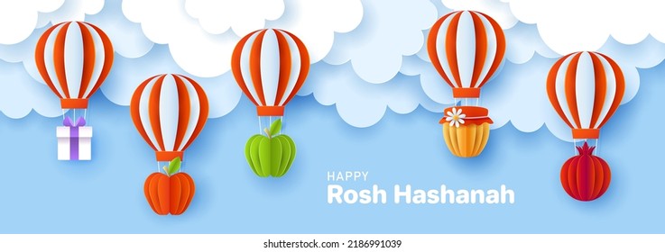 Rosh Hashanah Jewish holiday banner design with paper cut hot air balloon, apple, honey and pomegranate. Vector illustration. 