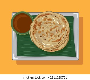 Roti prata on banana leaf served on a plate