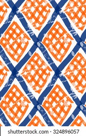 Rough brush diamond grid with orange checkered.Abstract colorful seamless background. Stained and grunted texture over hand drawn paint brush ornament.