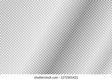 Rough dotted halftone with diagonal gradient. Black and white vector texture. Vintage effect graphic decor. Retro dotted overlay. Monochrome halftone background or foreground. Perforated surface