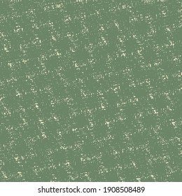 Rough green canvas, as if made of square patches. Floor carpet with a mosaic pattern.