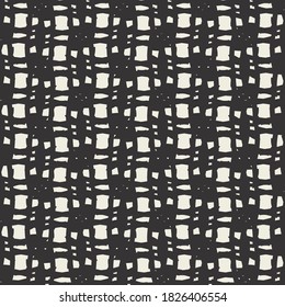 Rough plaid or tartan pattern. White surface decorated with black.