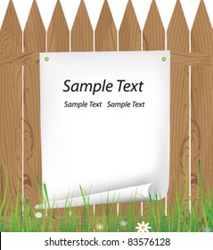 Rough sheet of paper on a wooden fence