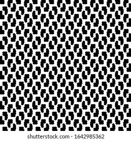 Rough signs in the shape of L letter, in a few alternative positions. White surface with black spots. Wallpaper texture. Textile pattern.