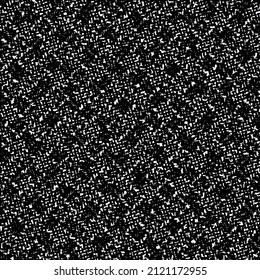 Rough textile material with square patches and flecks. Tweed texture. Graphics in black and white.