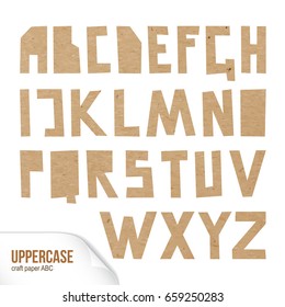 Rough uppercase characters cut out of craft paper. Cardboard capital letters. Vector carton ABC on white background