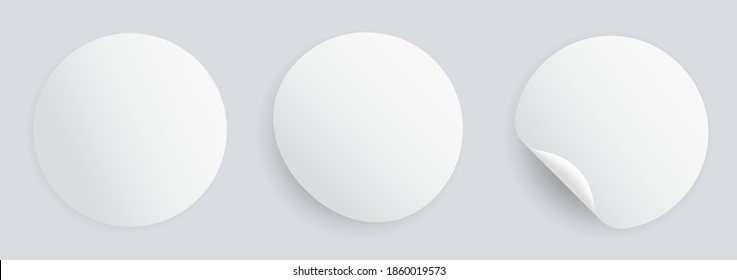 Round adhesive stickers with curved corner. White paper tags. Blank mockup circle sticky label. Realistic textures. Vector illustration, EPS10.