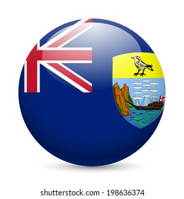 A round badge in the colors of Saint Helena flag.