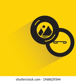 round badge with label on yellow background