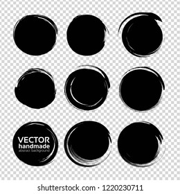 Round black abstract textured smears isolated on white background