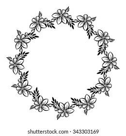 Round black and white frame with flowers
