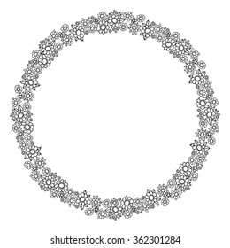 Round black and white frame with flowers.