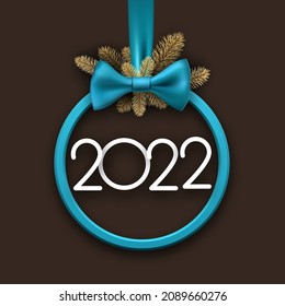 Round blue Christmas bauble frame with 2022 sign and fir branches. Vector holiday illustration.