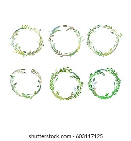 Round borders made of hand drawn herbs and flowers. Floral wreath. Herbal frame. Greenery set isolated on white. Vector rustic design great for spring or summer theme or to ornate quote or logo. 