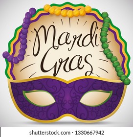 Round button with colorful necklaces hanged on it and beautiful mask ready to be worn during Mardi Gras carnival.