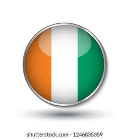 Round button national flag of Ivory Coast with the reflection of light and shadow. Icon country. Realistic vector illustration.