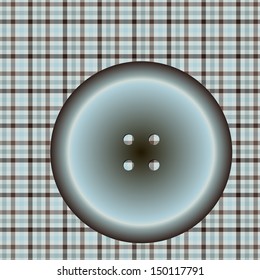 round button on a checkered cloth surface