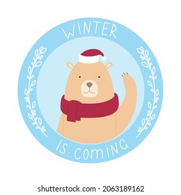 Round card with a cute bear in a hat and a scarf with the words "Winter is coming". Vector illustration for cards, invitations, stickers, t-shirts