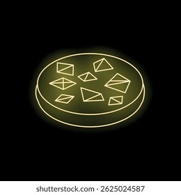 Round chocolate chip cookie glowing with yellow neon light on a black background