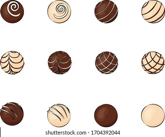 Round chocolates with decor isolated on white