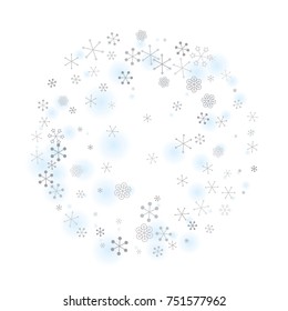Round Christmas background with random scatter falling silver snowflakes and blue blurred dots isolated on white.
