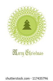 Round christmas decoration with spruce in center.
