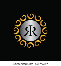 round circle gold ornament initial logo
